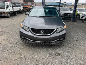 Honda Civic EX-L w/Navigation 2dr Coupe (1.8L 4cyl CVT) 2015 Gray