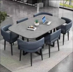 Marble Dining Table With Blue Colored Seats