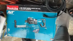 Makita Hr2661 1" Avt Rotary Hammer With Hepa Dust Extractor.