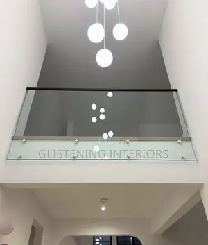 Staircase 10mm Plain Tempered Glass With A Black Profile And Stud