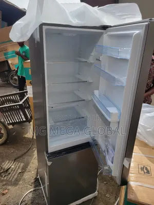See This Tall Hisense Double Door With Dispenser