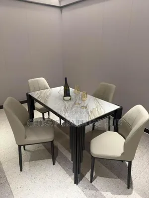 Dinning Table by 4 Seaters