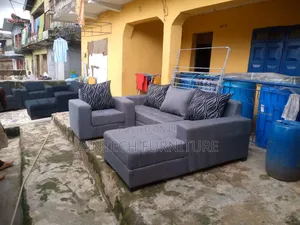 L Shape Sofas and a Single Seater Couch Gray