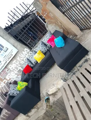 L Corner Sofas and Four Throw Pillows