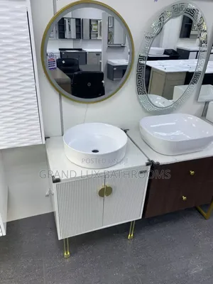 Modern White Bathroom Vanity With Round Mirror and Vessel Sink