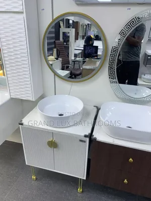Modern White Bathroom Vanity With Round Mirror and Vessel Sink