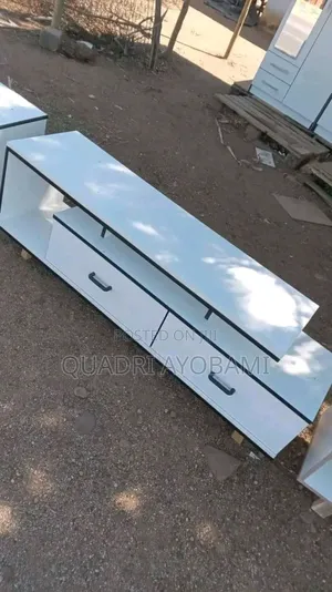 Tv Stand With Children and Open Place