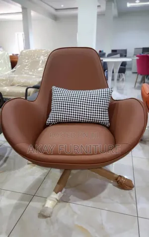 Lounge Chairs In Brown And Orange Colors