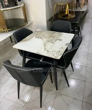 Stain Top Table With Leather Chairs
