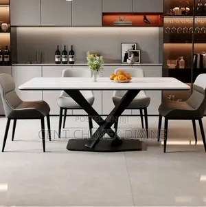 Crossed Leg Table With Leather Chairs