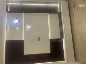 Quality Tv Panel With Side Shelves and Console Complimented With Led