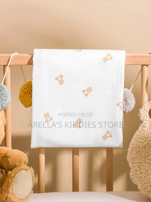 Lc Waikiki Baby Muslin Shawl With a Teddy Bear Print.