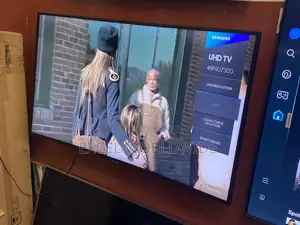 Clean 49” Curved Samsung Uhd Smart Tv With HDR Enhanced Contrast