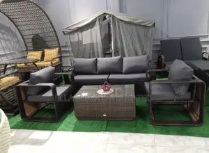 Luxury Rattan Sofa by 5 Seaters and a Centre Table.