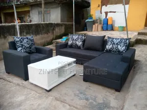 Brand New L Shape Sofas and a Center Table