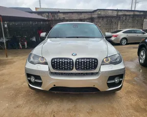 BMW X6 xDrive35i 4x4 Coupe (3.0L 6cyl 8A) 2011 Gold