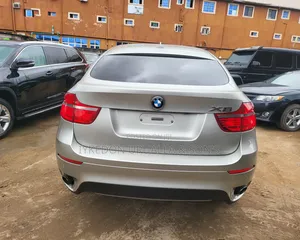 BMW X6 xDrive35i 4x4 Coupe (3.0L 6cyl 8A) 2011 Gold