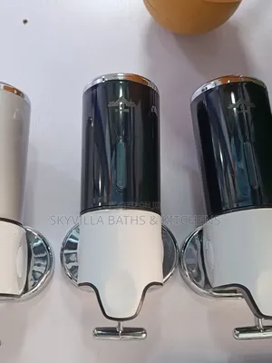 Wall Mounted Liquid/Soap Dispenser.