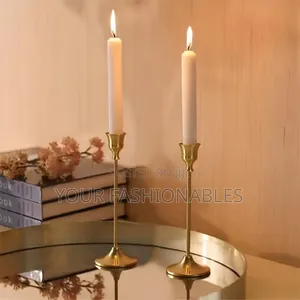 An Elegant Pair Of Gold Vintage Candle Stands
