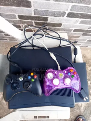 Uk Used Xbox 360 Slim With Games and 2 Pads