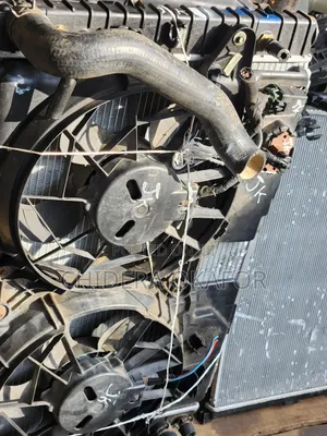 Radiator and Fan For. Ford Escape. /. 010