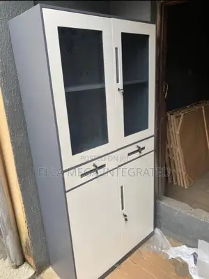 Book Shelves With Glass Front Together With Drawers Etc.