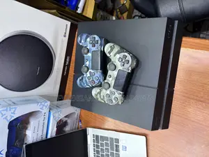 Ps 4 Fat Uk Used With 2 Pads and 12 Games Installed