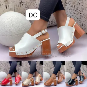 Classic Designer Wedge Sandals.