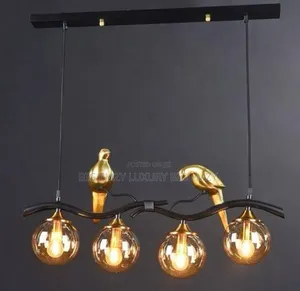 Twig Island Chandelier or a Golden Parrot Pendant Light.