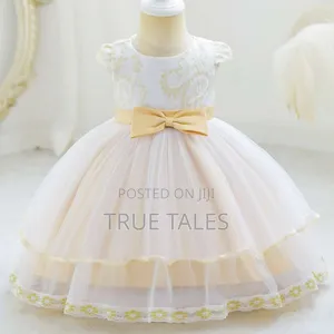 Baby/Toddlers Frilly Cream And Gold Dress Ages 3 Months To 3 Years
