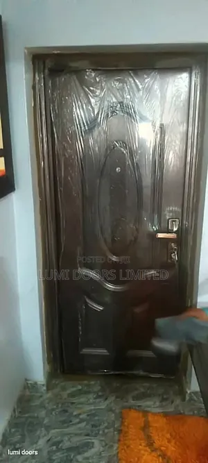 Brown Steel Door With Peephole