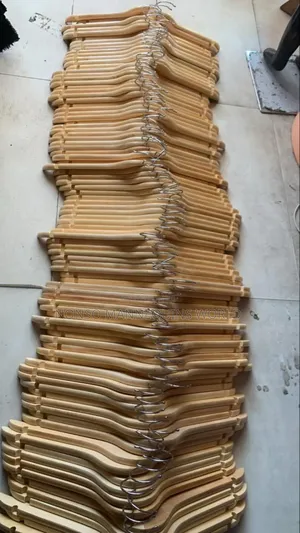 Packs Of Neat Sets Of Wooden Clothes Hangers