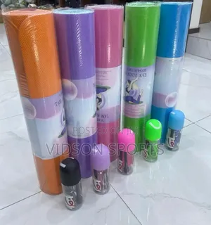 A Set of Double Color Yoga Mat With Skipping Rope and Abdominal Wheal