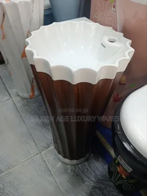 White and Brown Standing Basin