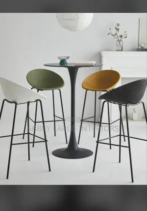 Four Bar Stools With One Table