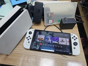 Nintendo Switch Oled With 4 Games