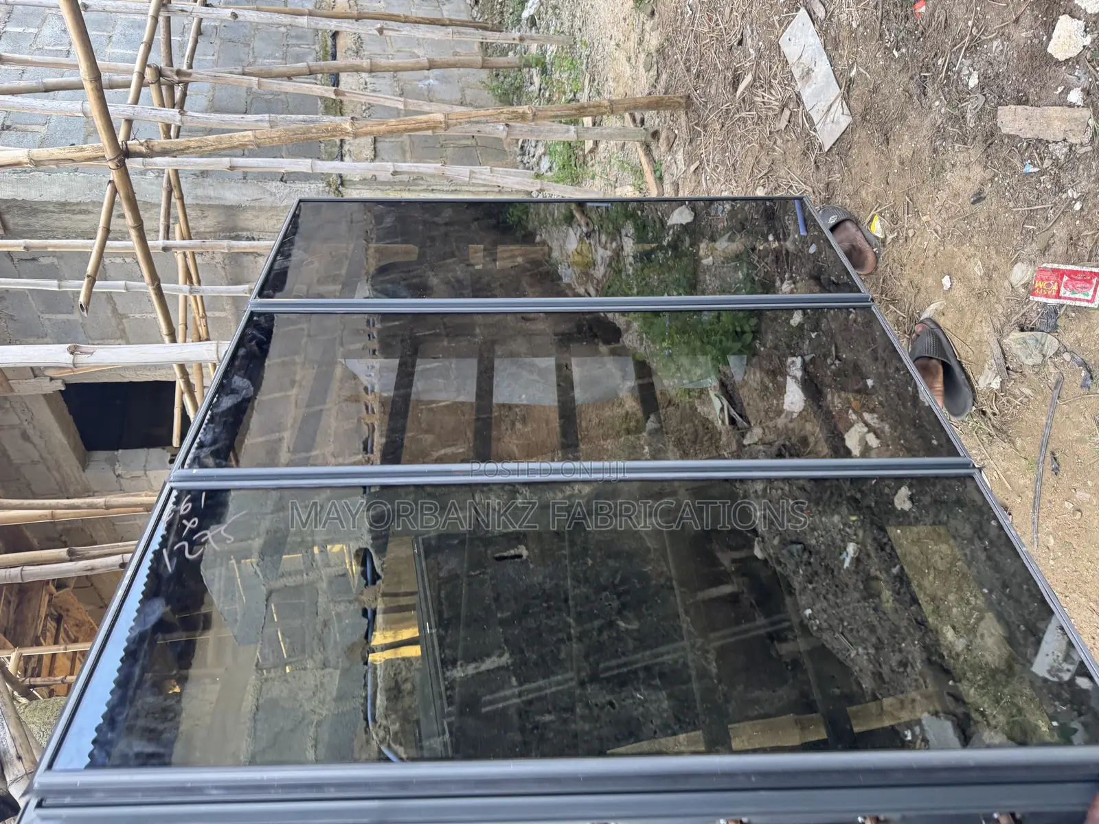 Gray Color Frameless Window With Collapsible Net