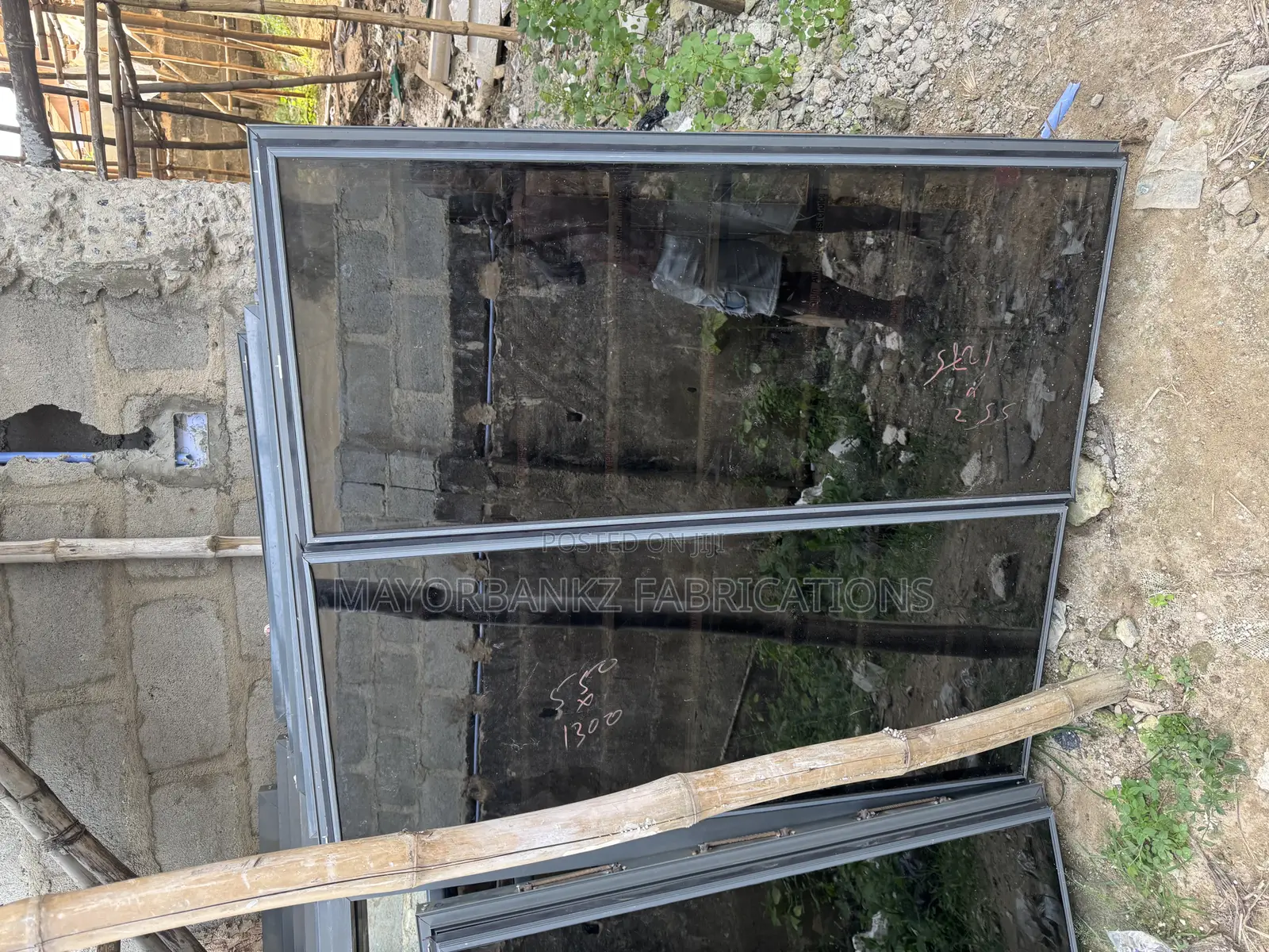Gray Color Frameless Window With Collapsible Net