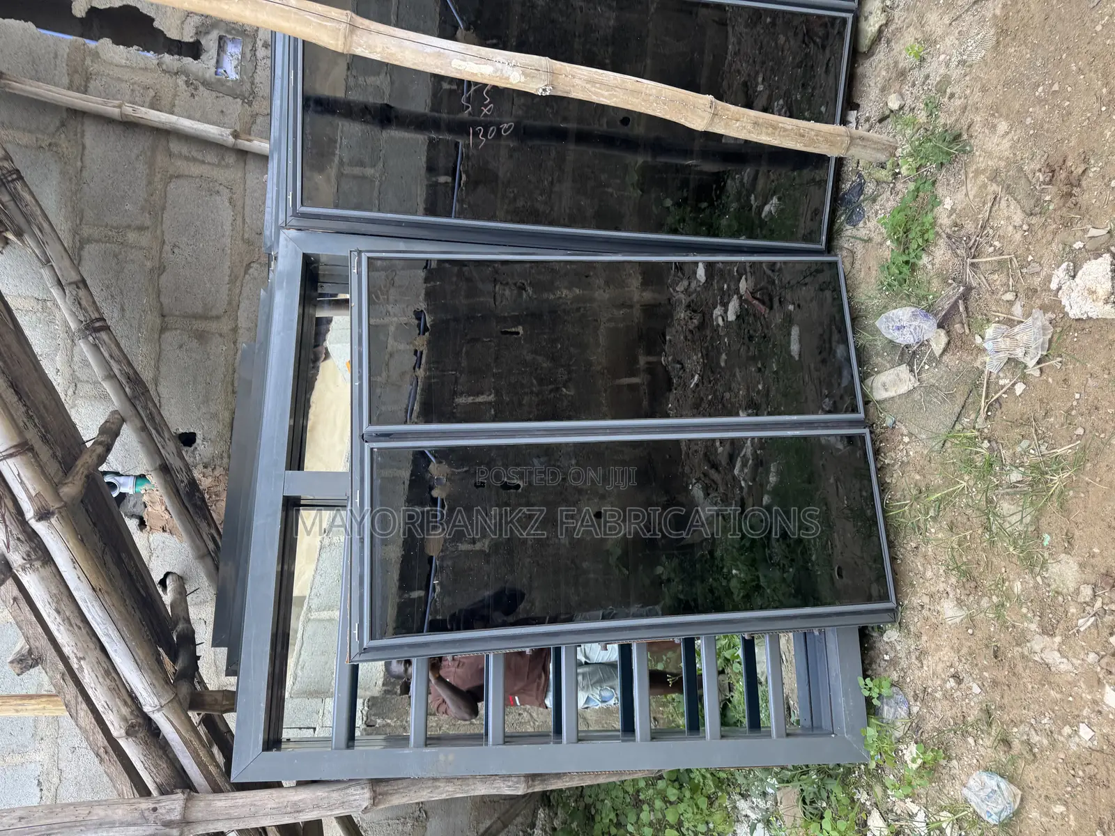 Gray Color Frameless Window With Collapsible Net