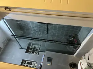 Plane Sliding Shower Cubicle With Black Accessories