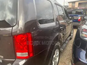 Honda Pilot EX-L 4dr SUV 4WD (3.5L 6cyl 5A) 2014