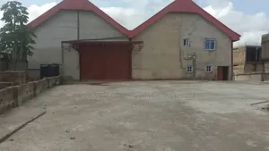 A Warehouse for Rent at Asaba Express Way Opposite Road Safety