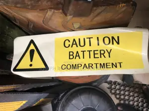 Caution Battery Compartment