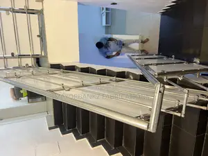 Stainless Handrail Protected With Boards