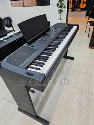 Yamaha Keyboard DGX-670 With Stand and Pedals. Grand Piano.