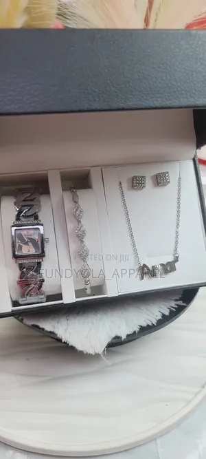 Guess Female Wrist Watch and Necklace Combo