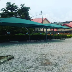 Galvanized Pipe Carport With Green Covering - Nature's Blend