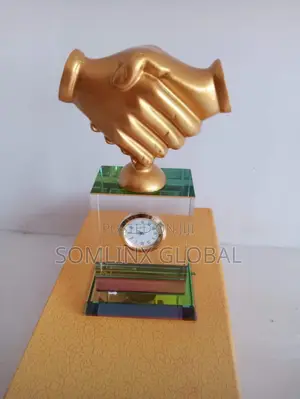 Golden Handshake, Glass Trophy With Clock