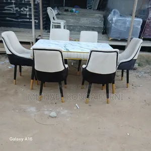 Unique 6 Seaters Dinning With High Gloss Top