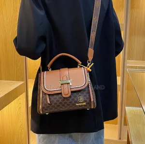 Monogrammed Women's Top-Handle Handbag With a Gold-Tone Buckle Closure